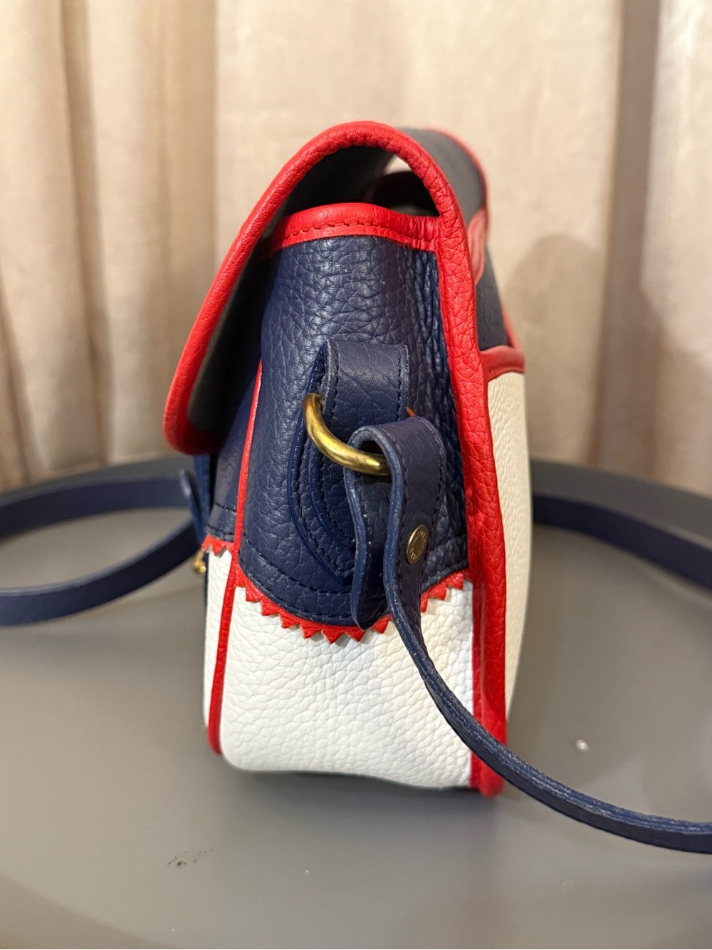 Dooney & Bourke Navy, White & Red Pebble Leather Crossbody Saddle Bag - Picture 4 of 8